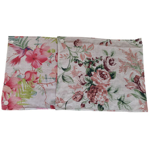 Deux carrés de sopalin lavables à pressions aux motifs à fleurs différents
